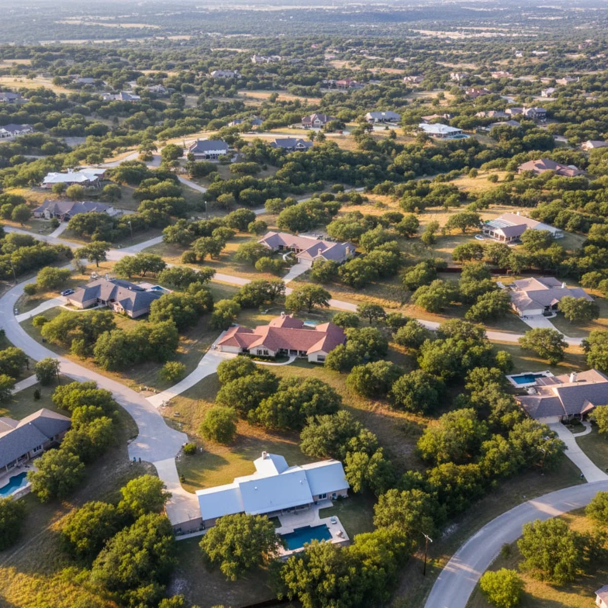 Texas Hill Country residential roofing with rolling hills landscape