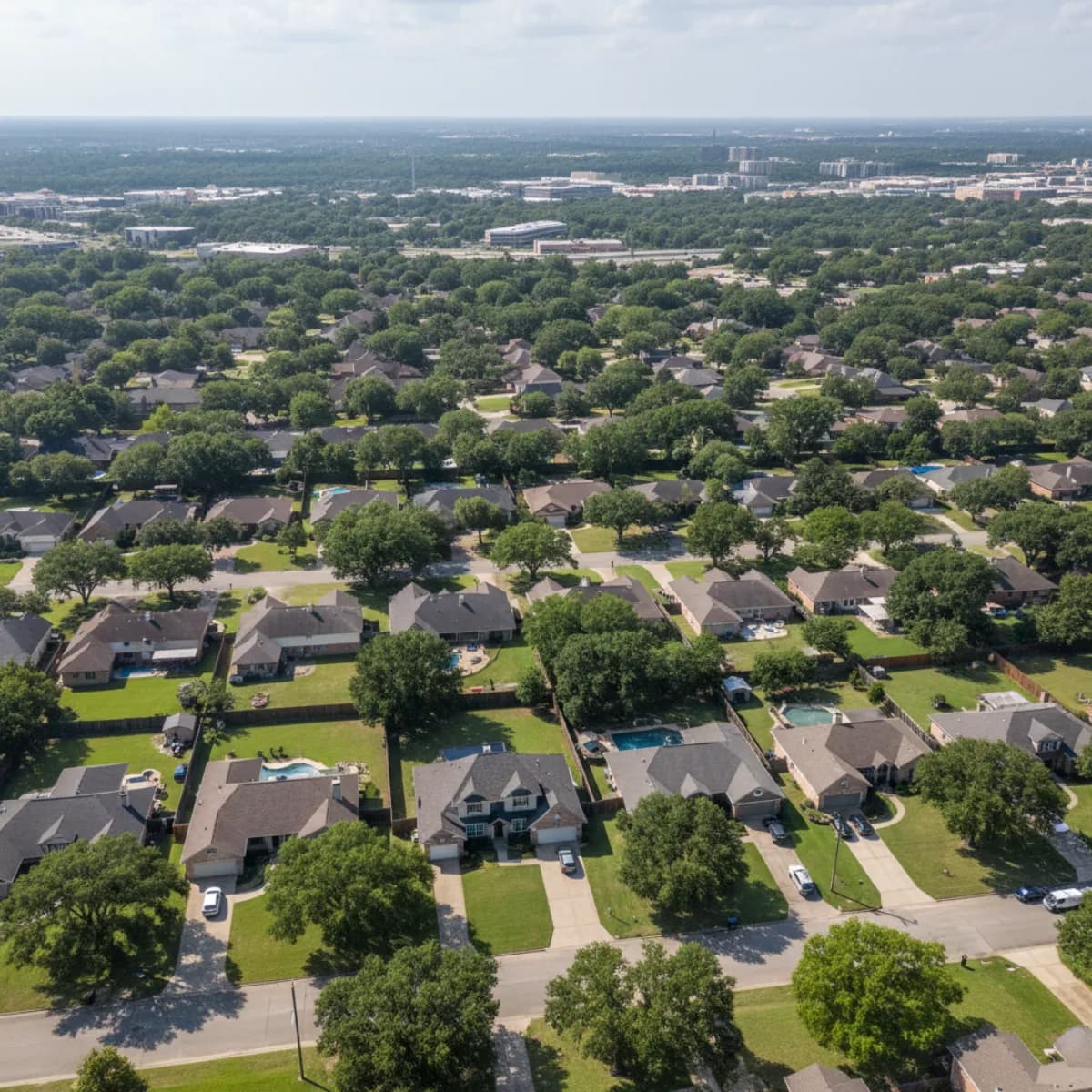 Aerial view of Greater Houston metro residential neighborhoods showing roofing across the sprawling metropolitan area